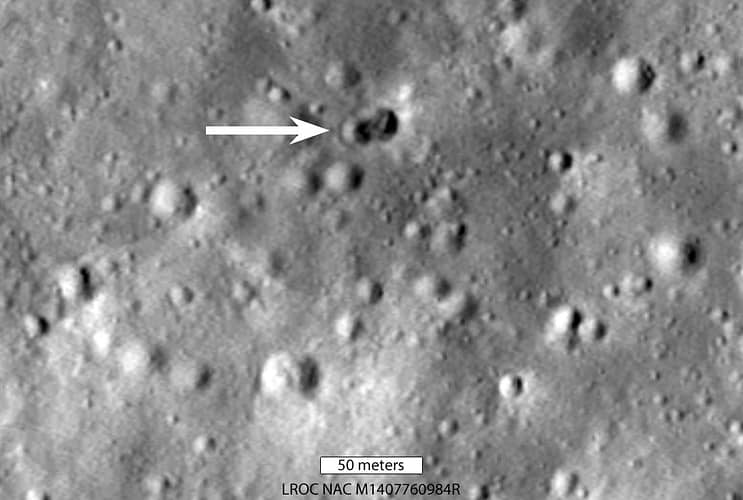 Image of the moon's surface and new crater