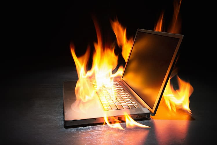 Laptop computer engulfed in flames