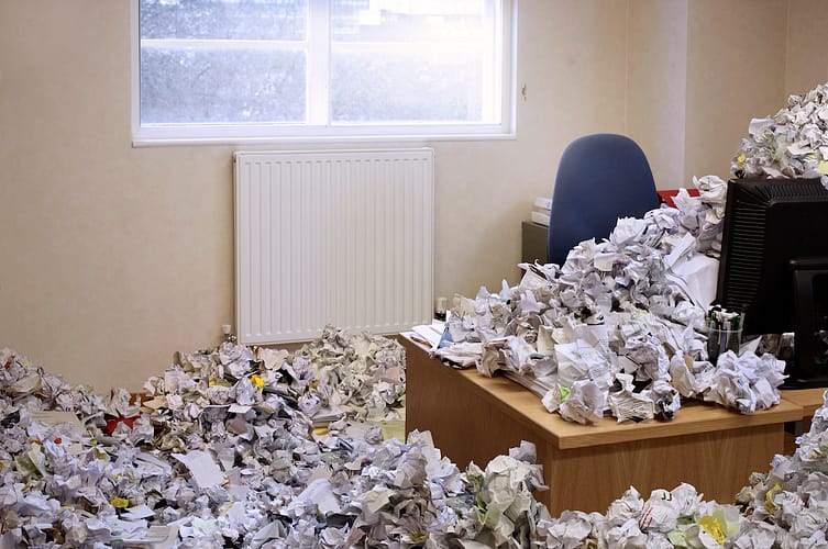 huge pile of rubbish covering office